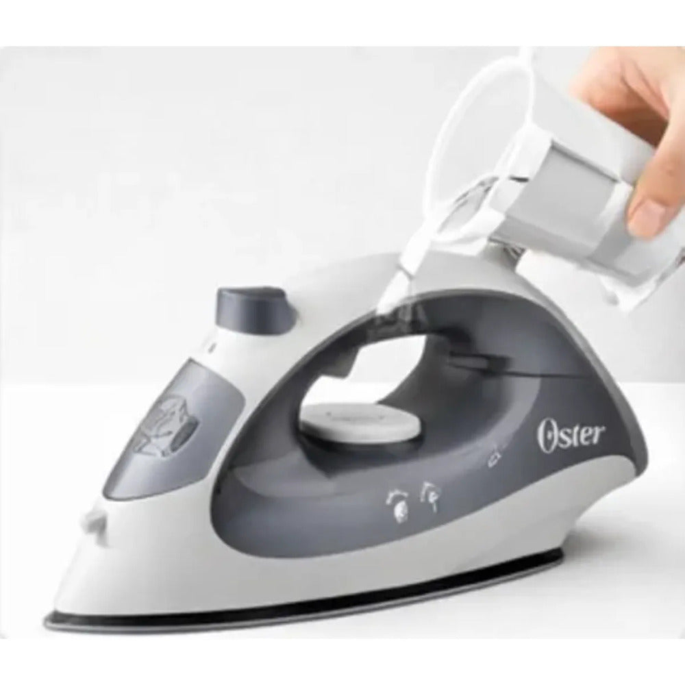 Plancha de Vapor Oster 1400W Compacta Antiadherente Ligera Ropa Impecable GCSTBS5001